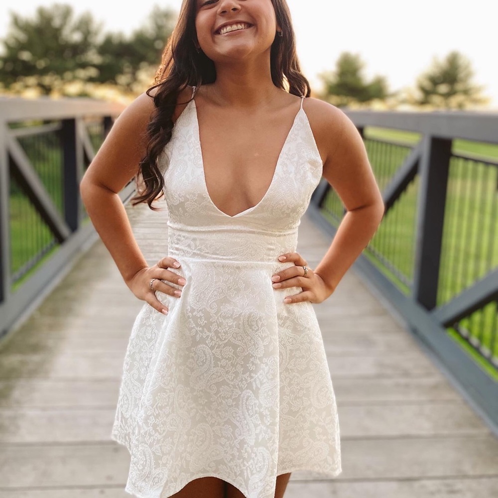 Lucy In The Sky, size small, super cute white hoco dress with silver designs